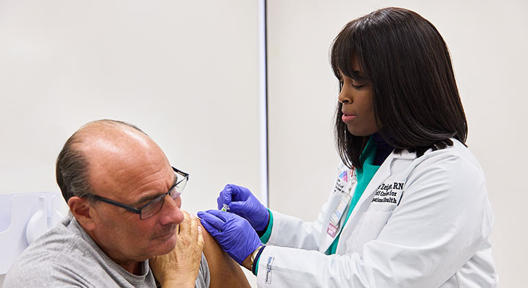 doctor treating patient